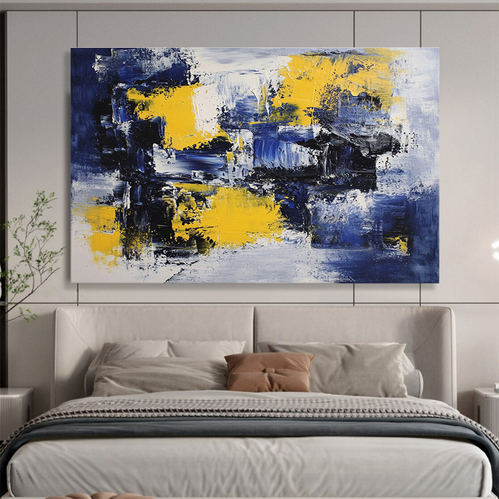 Large abstract painting featuring deep blue, white, and yellow accents with impressionist brush strokes on canvas ideal for modern wall decor.SC031