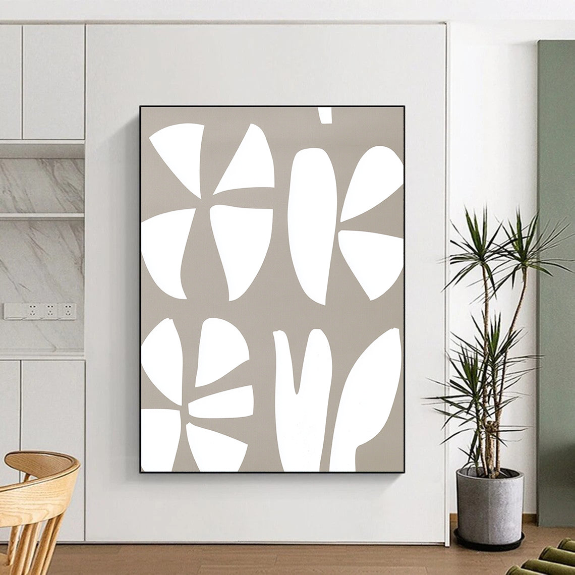 Large abstract painting featuring a white and gray pattern of the number three and two large flowers on a light brown background.STSC1240