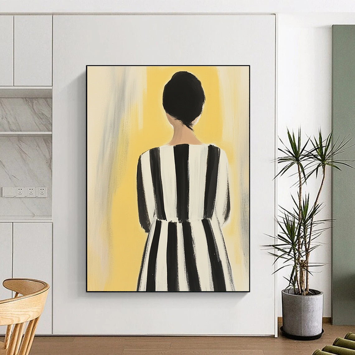 An abstract painting of a woman in a striped dress showcases feminine colors against a soft yellow background with bold black and white stripes.STSC1259