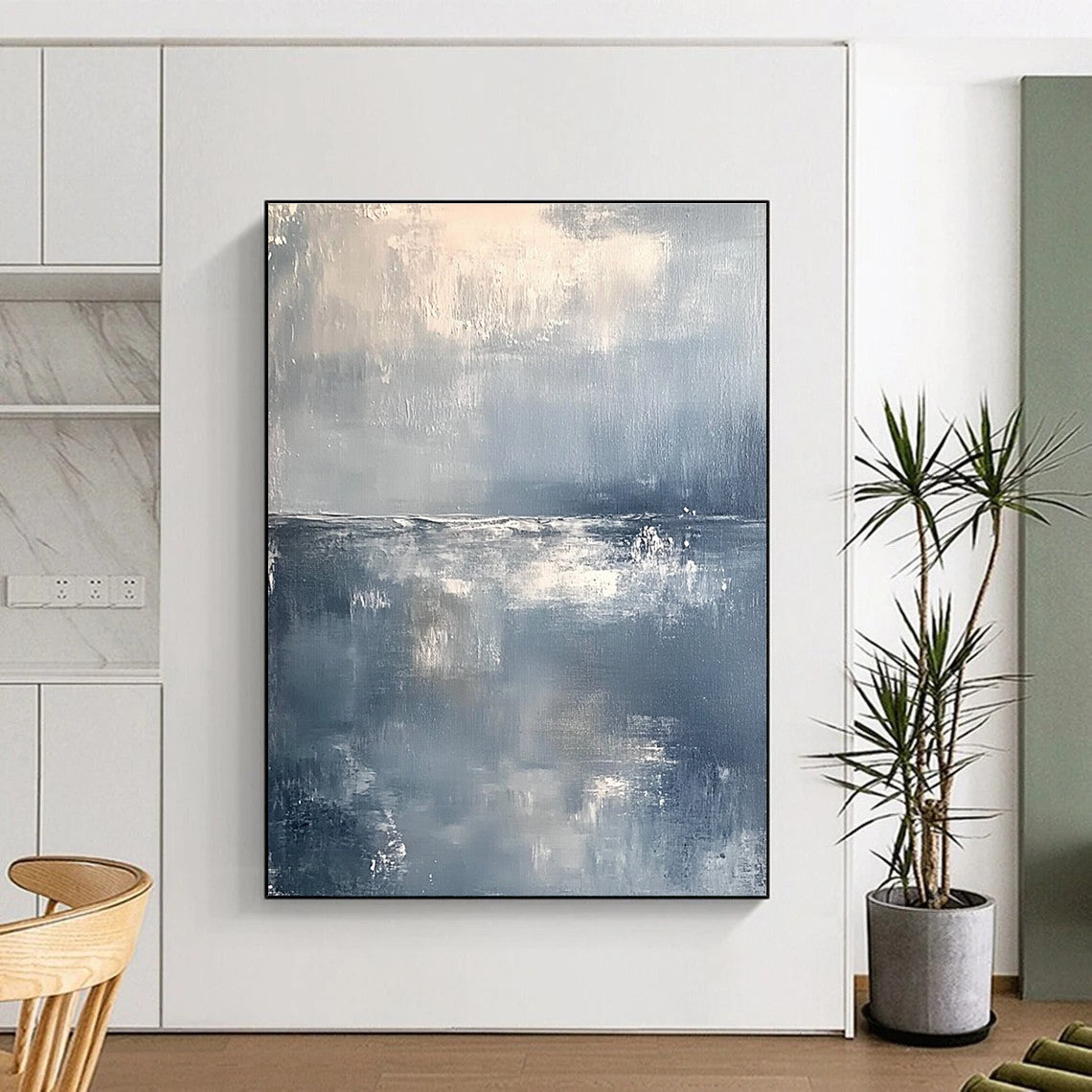 Large abstract painting of a serene ocean horizon in muted gray and white tones with soft brushstrokes conveying tranquility and elegance.STSC262