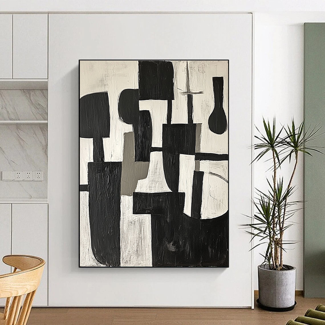 Large abstract painting in black and white shapes with gray tones on a white background embodying calmness and modernity inspired by Picasso's cubism.STSC675