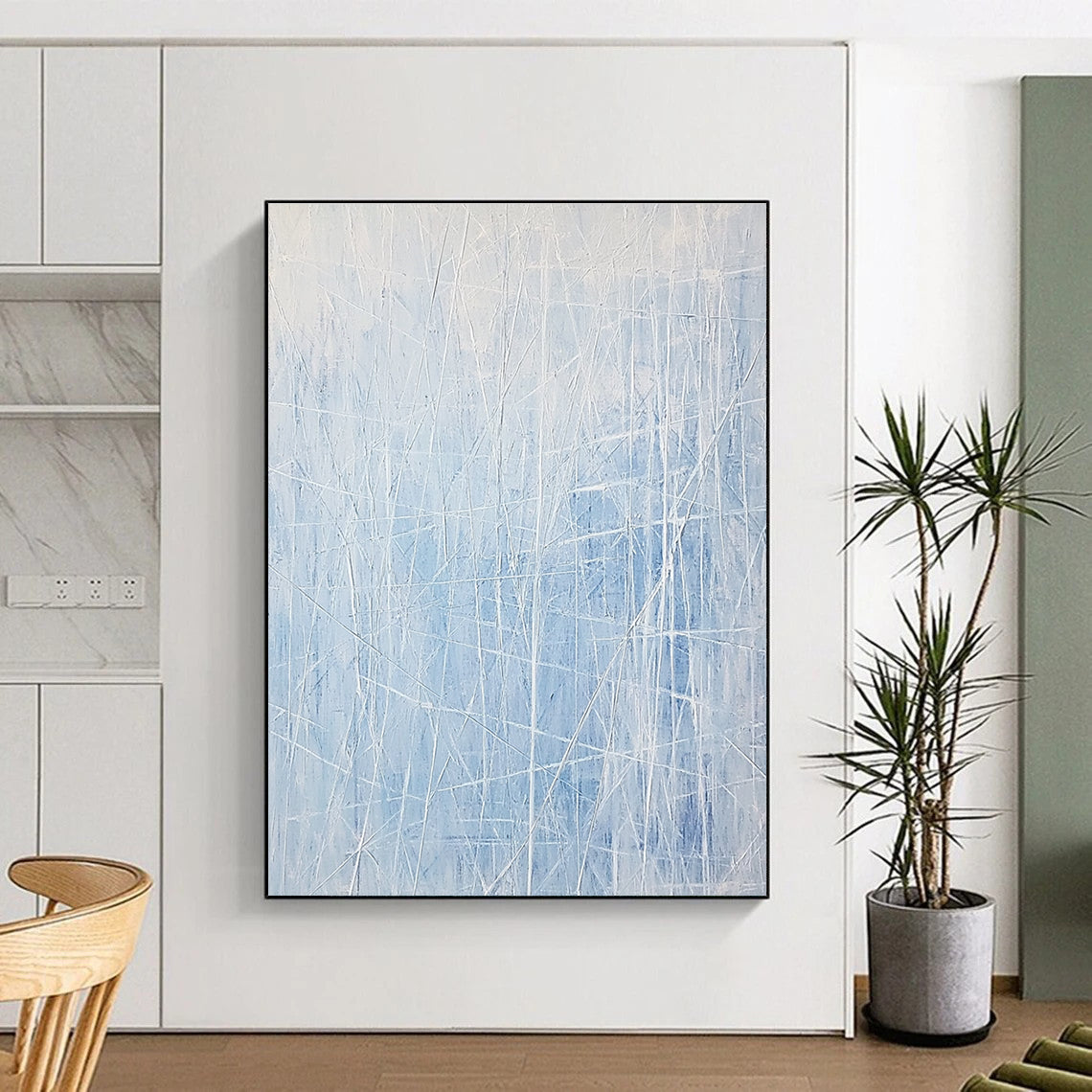 Large abstract painting featuring light blue and white lines resembling an icy landscape with vertical lines and scattered ice formations.STSC317