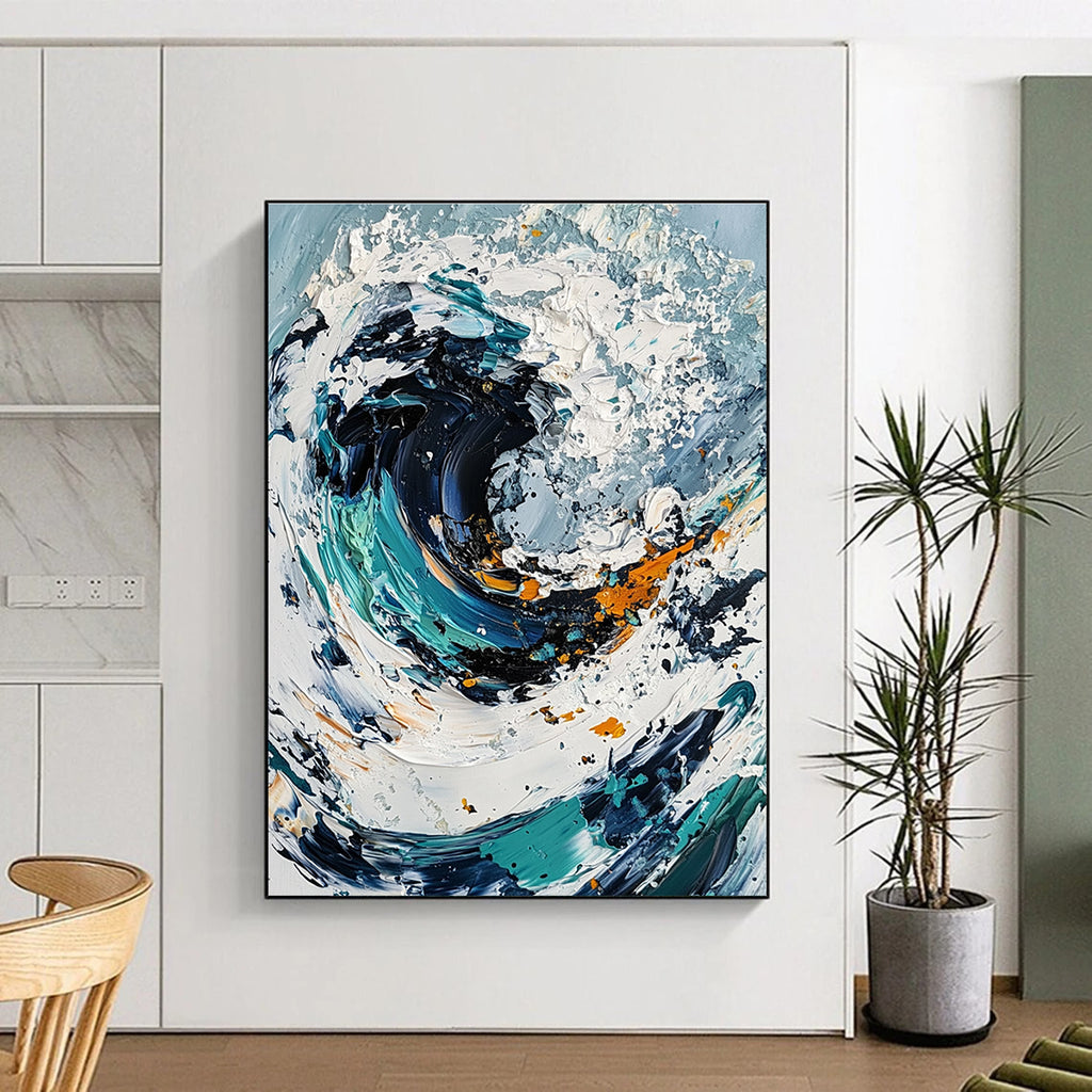 Large abstract painting of an ocean wave in white and blue tones with black center and colorful details created using a palette knife on canvas.STSC263