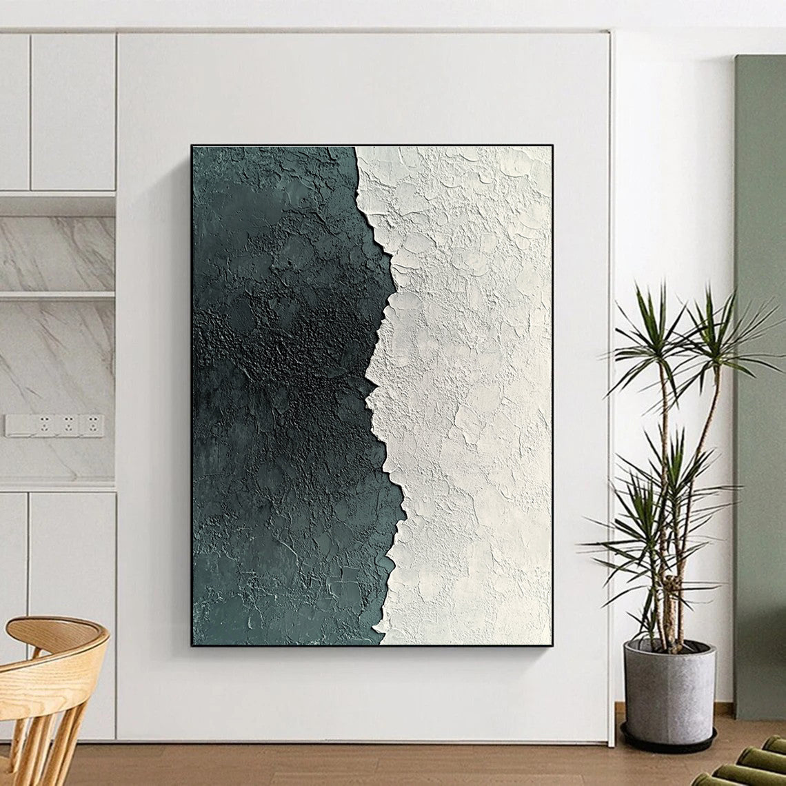 Large abstract painting of textured white and grey plaster with deep green accents showcasing detailed patterns and a captivating grainy finish.STSC836