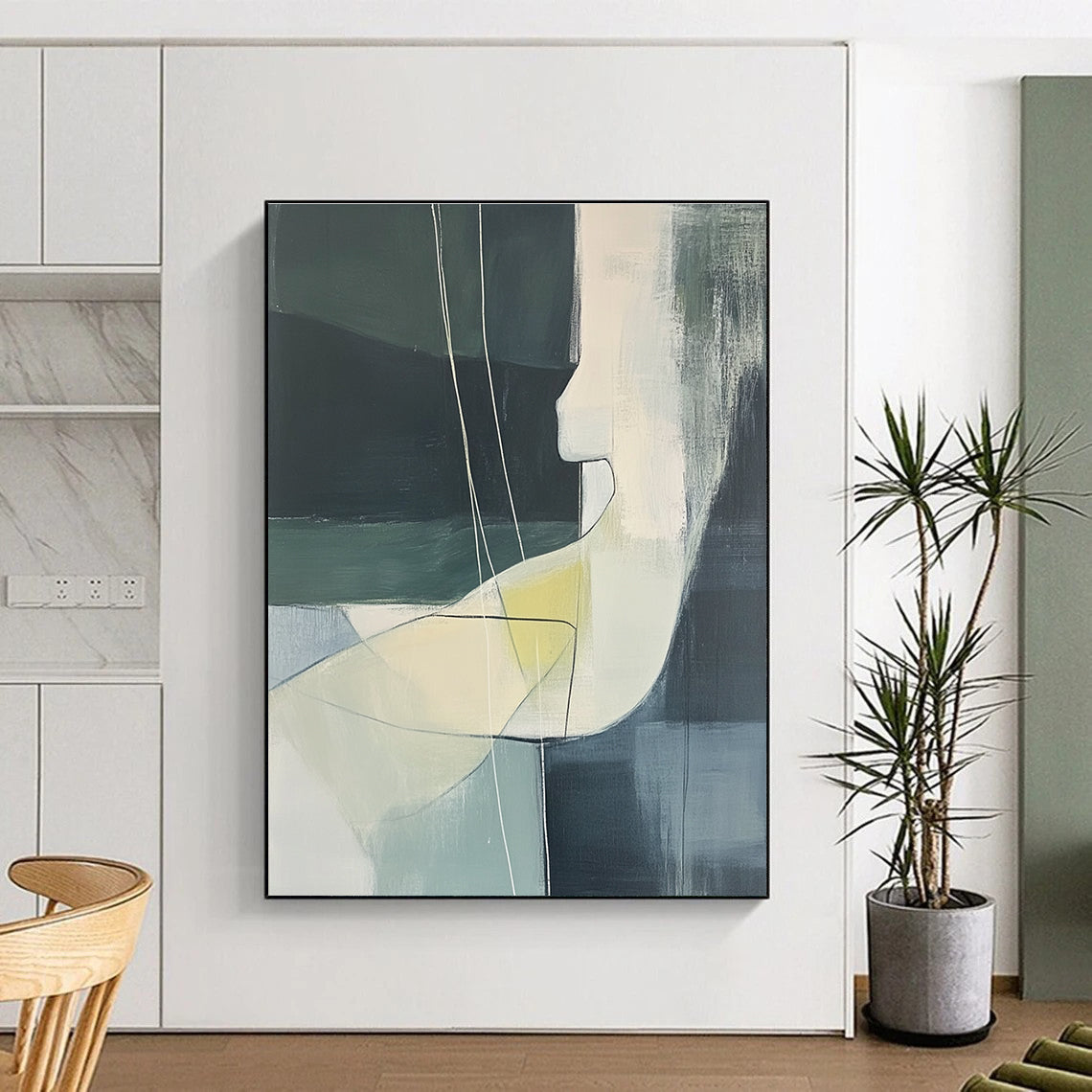 Large abstract painting featuring a woman's body in soft green and grey tones with white lines and yellow details on a black background.STSC672