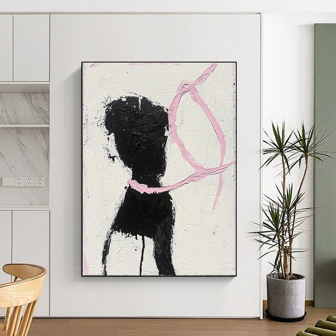 Abstract painting featuring a woman in black and white dancing with a pink ribbon surrounding her neck showcasing visible brush strokes and textured canvas.STSC1334
