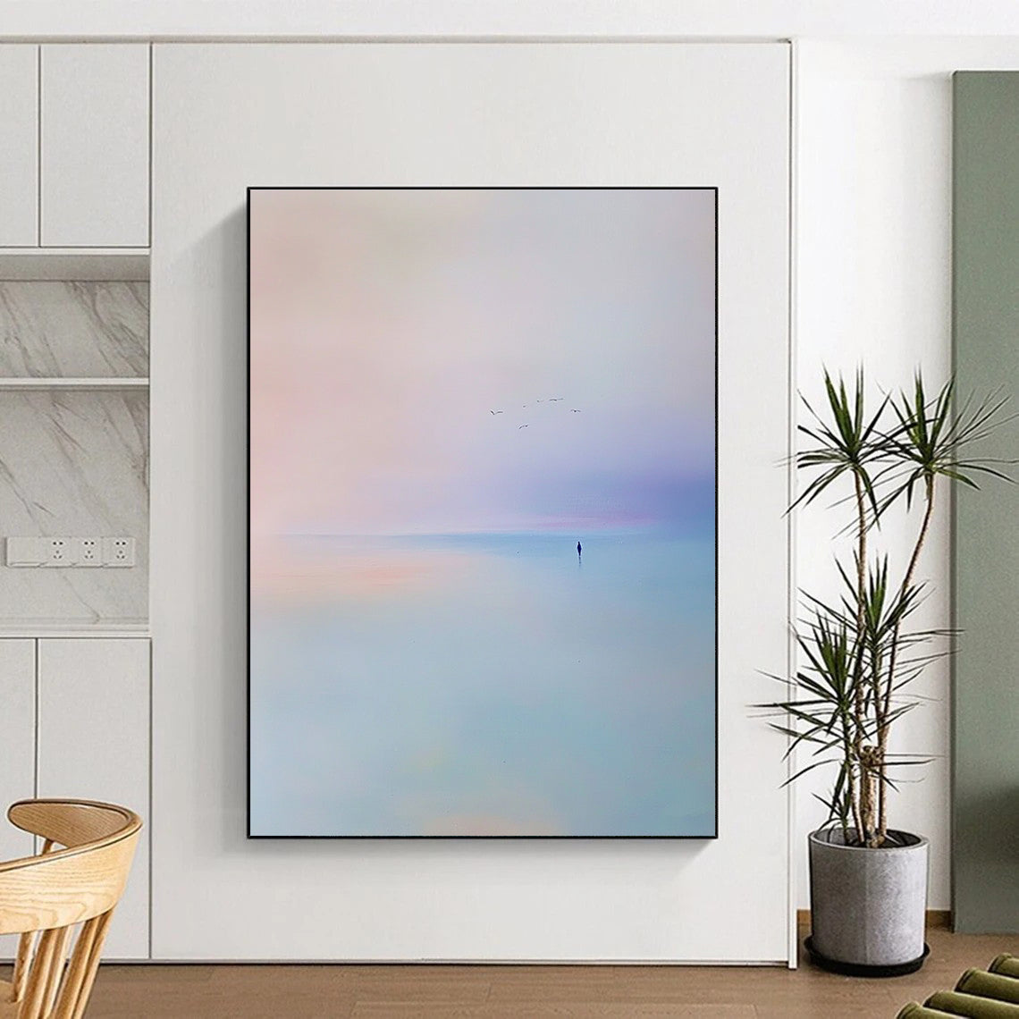 Abstract painting of the sea featuring a light blue and purple sky with soft tones and minimalist style capturing a serene beach scene with flying birds.STSC346