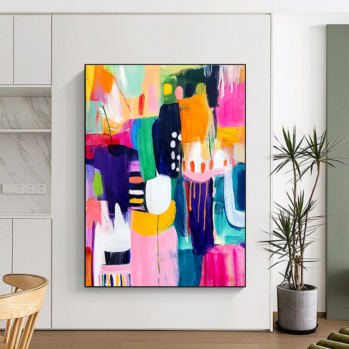 A large abstract painting bursting with vibrant colors and dynamic shapes representing happiness creativity and playful celebration in an art gallery setting.STSC1219