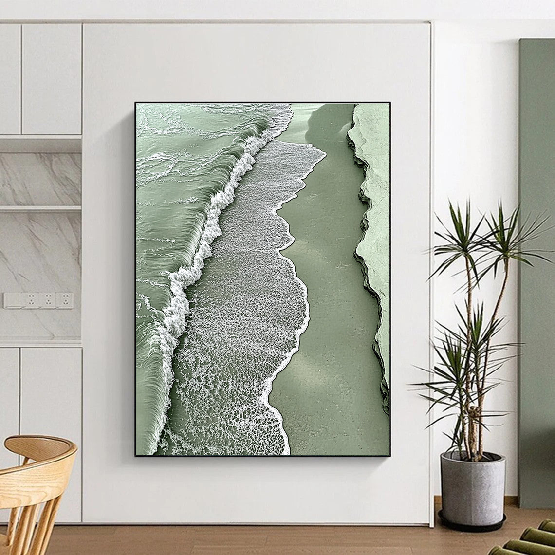 A large abstract painting featuring a light green sea with white foam and sandy waves evokes tranquility and nature's beauty.STSC533