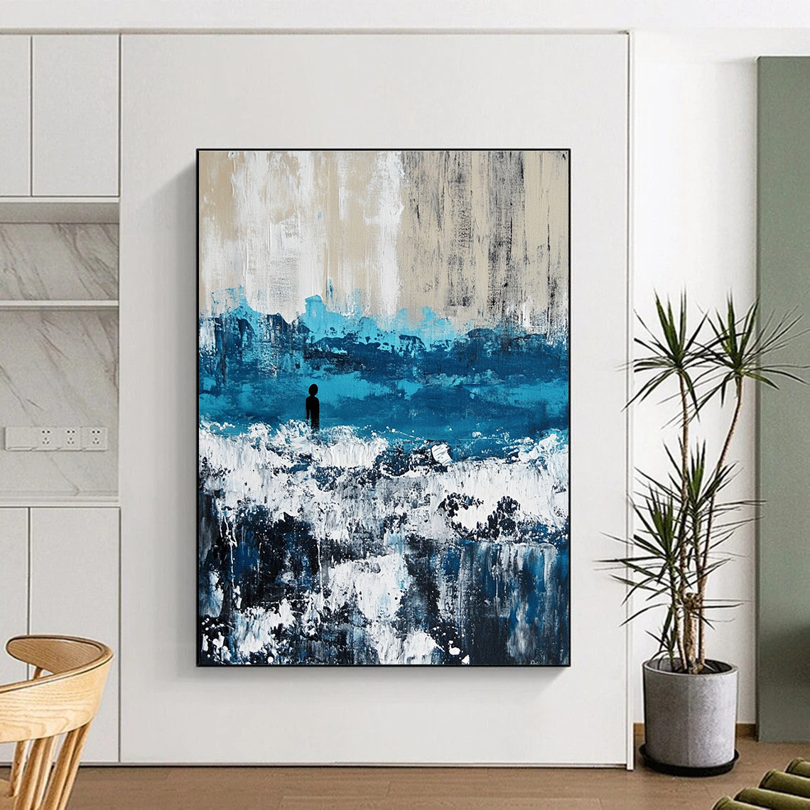 Large abstract painting of an ocean with waves in blue and gray featuring white caps for a serene coastal ambiance.STSC266