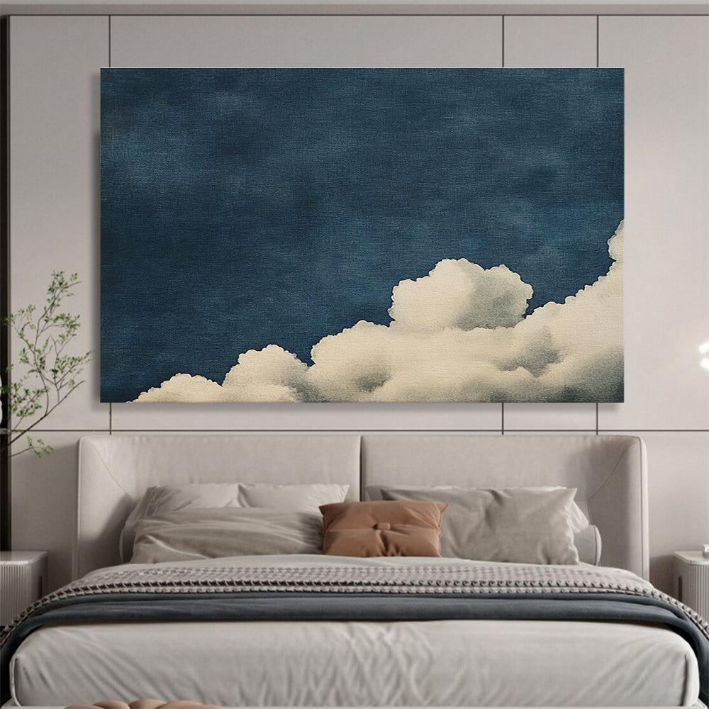 Large abstract painting of clouds on textured canvas featuring high contrast white clouds against a minimalist dark blue background.SC523