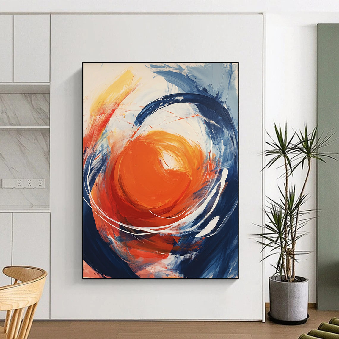 Large abstract painting featuring an orange orb with swirling white energy against a light gray background showcasing vibrant colors and dynamic brushstrokes.STSC744