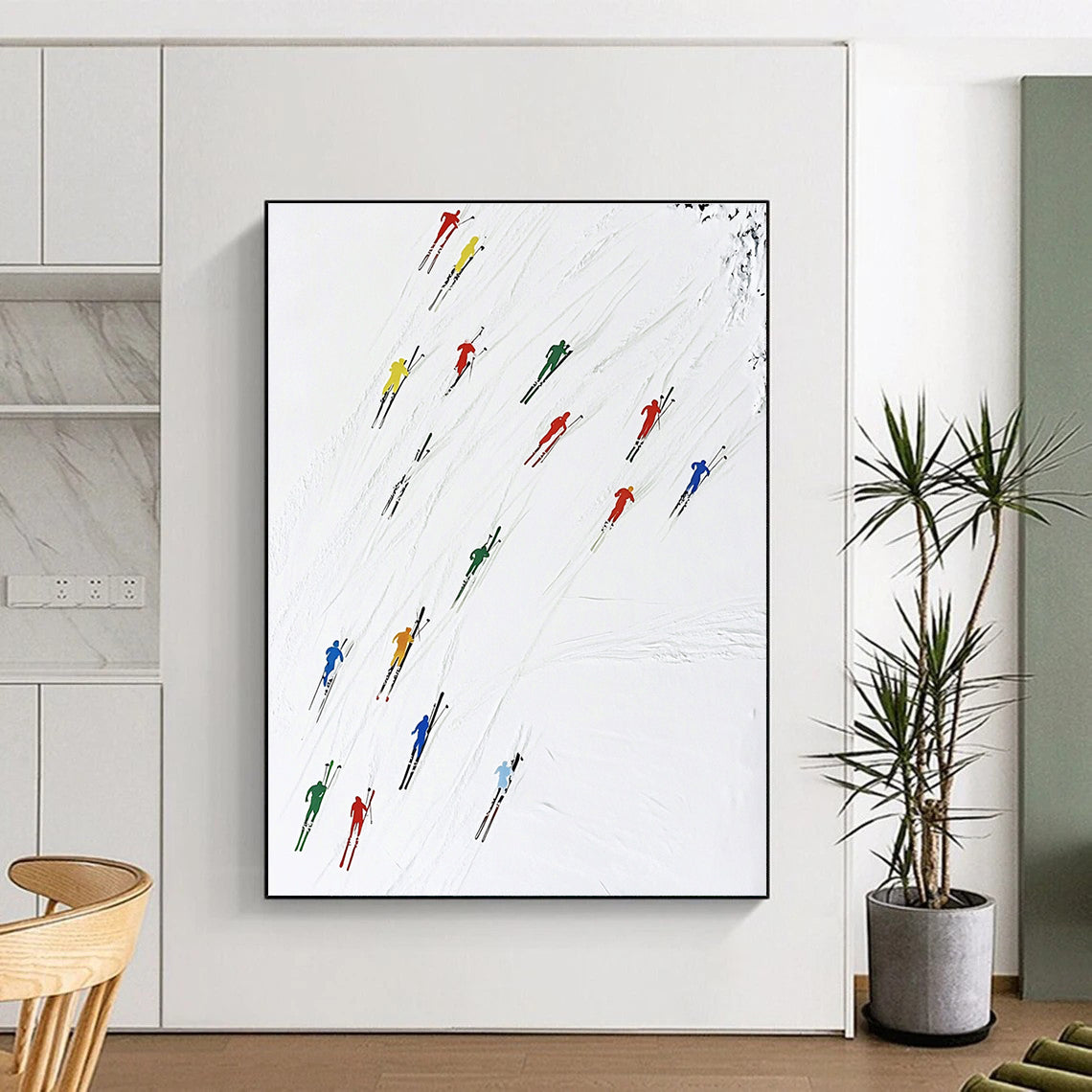 A large abstract painting featuring colorful skiers dynamically moving across the snow capturing speed and vitality in a minimalist style.STSC986