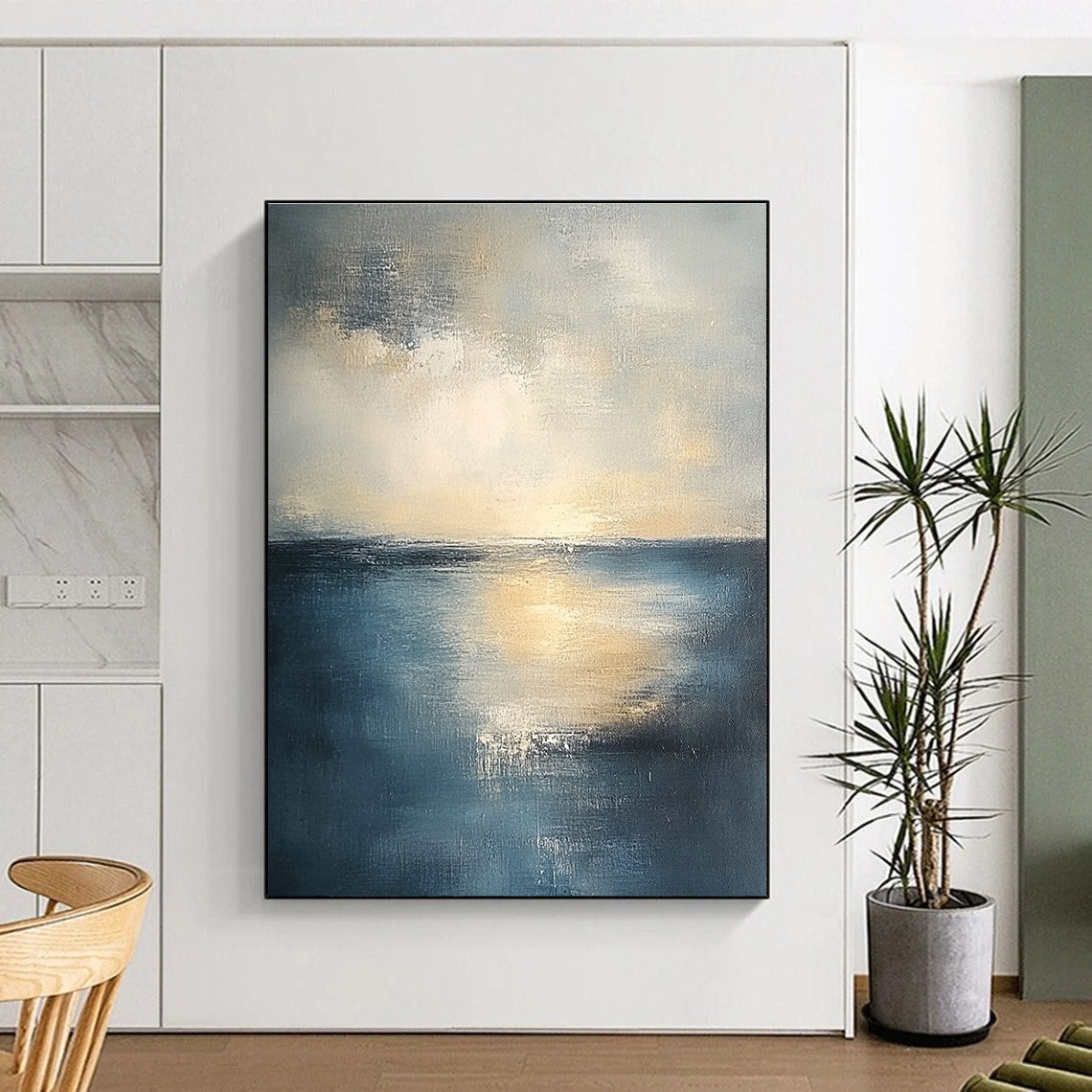 Abstract seascape in muted blue and grey tones with warm yellow sunlight evoking tranquility and reflection on canvas using soft oil paint gradients.STSC461
