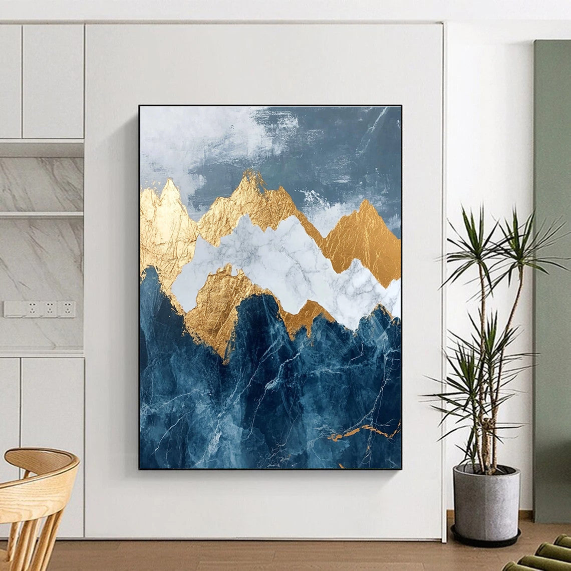 Abstract marble and gold leaf painting of mountains in dark blue and white features intricate details with stunning golden accents.STSC122