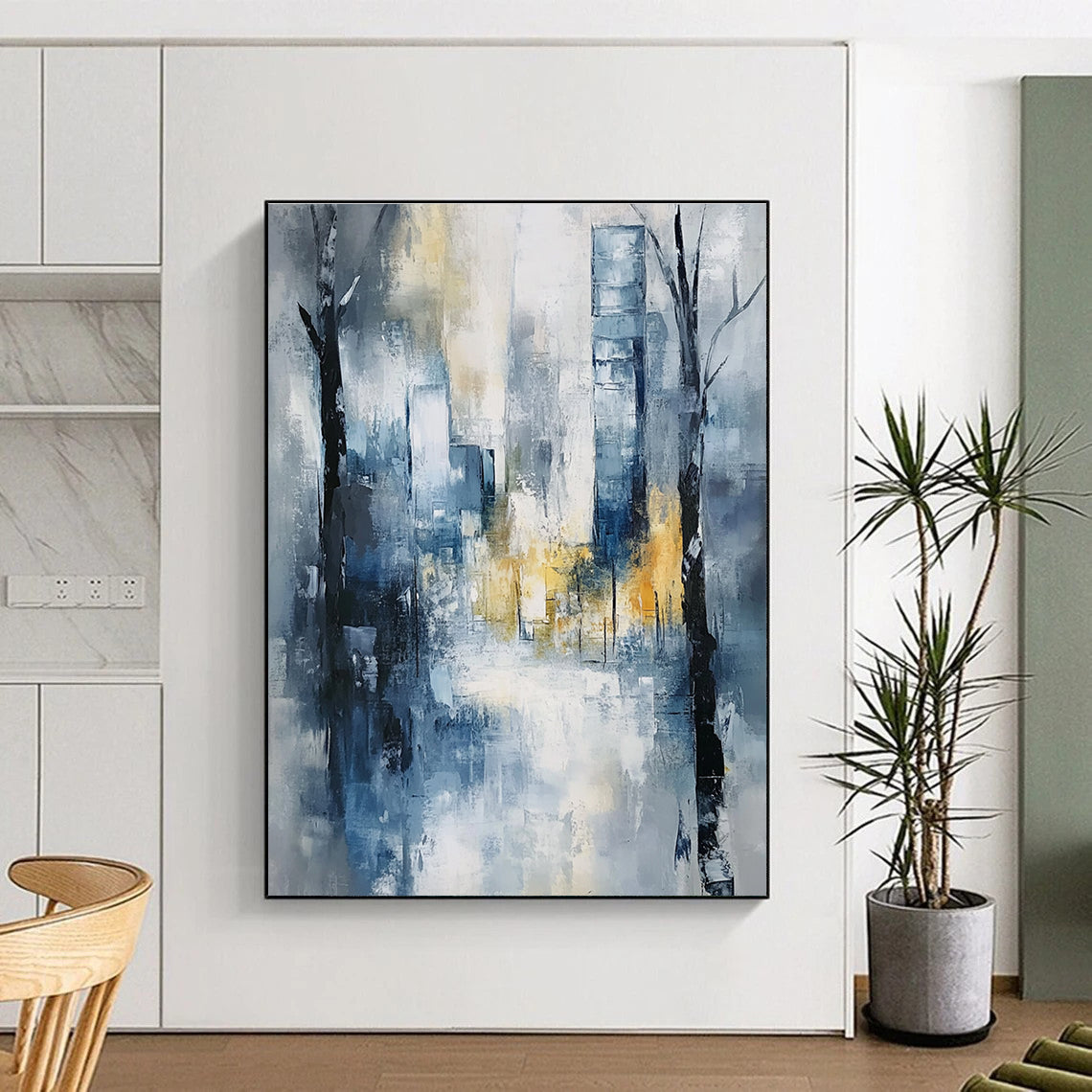Large abstract painting of an urban cityscape in soft blue and grey tones with hints of yellow and white, featuring expressionist elements and a serene mood.STSC278