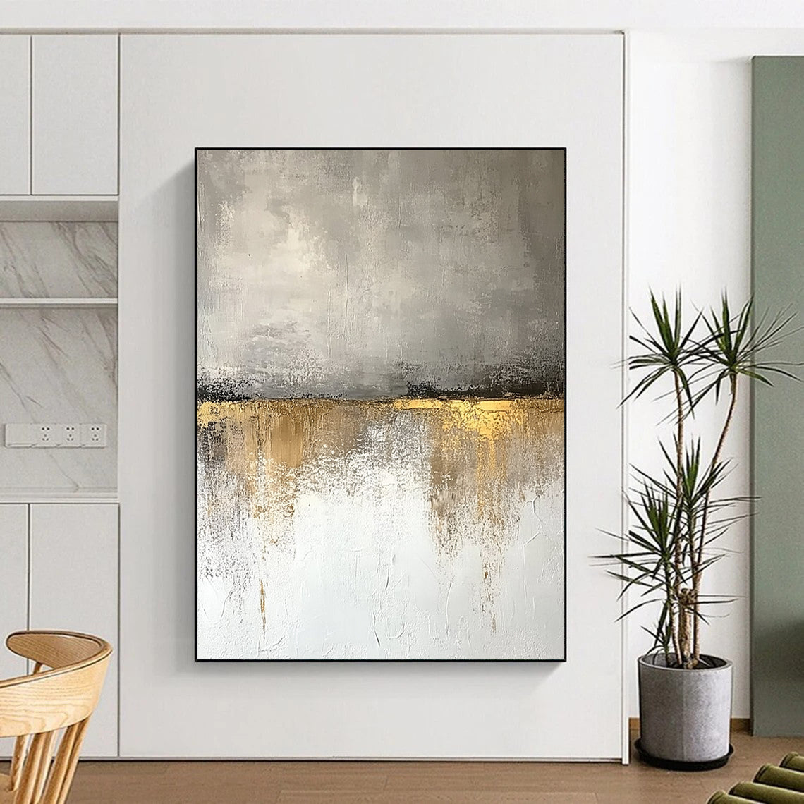 Large abstract painting featuring beige and gray tones with textured wall, golden accents, and a neutral color palette reflecting nature's beauty.STSC410
