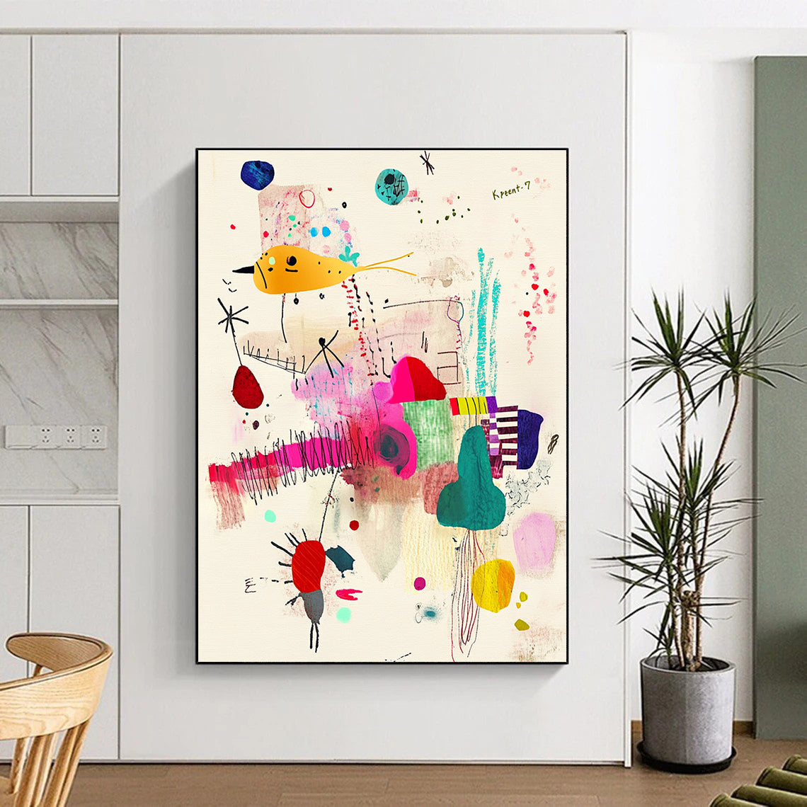 A large abstract painting featuring Krent-7 with whimsical patterns and vibrant fabric scraps on a beige background.STSC1235
