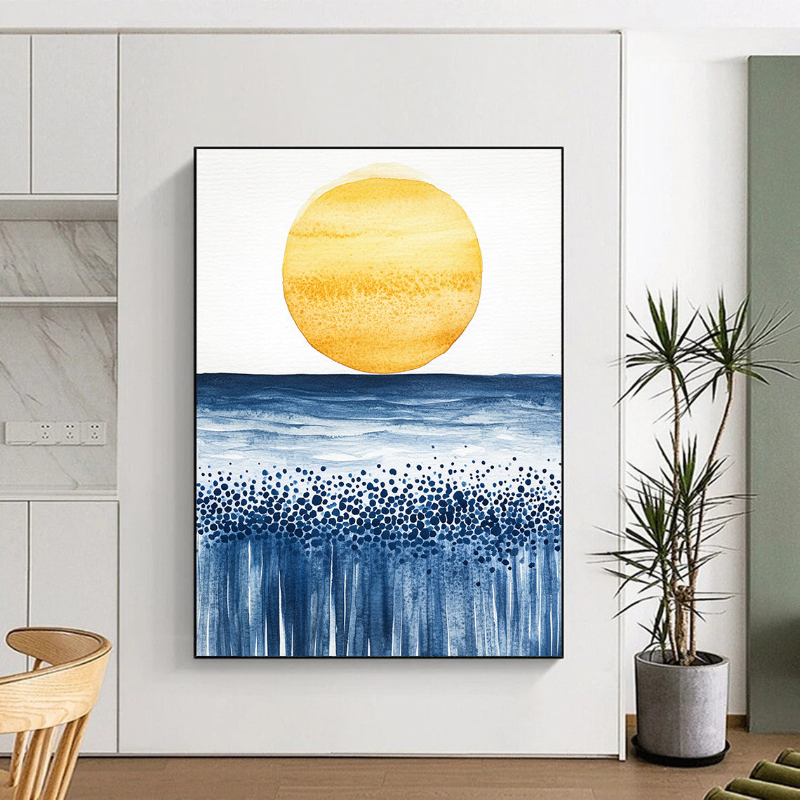 Abstract watercolor painting of a sun rising over the ocean with minimalist yellow and blue tones on textured paper.STSC505