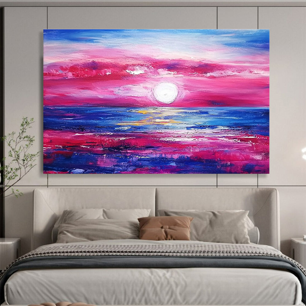A large abstract painting featuring a pink and blue sunset over the ocean with purple and red clouds by artist Anna Bocek.SC537