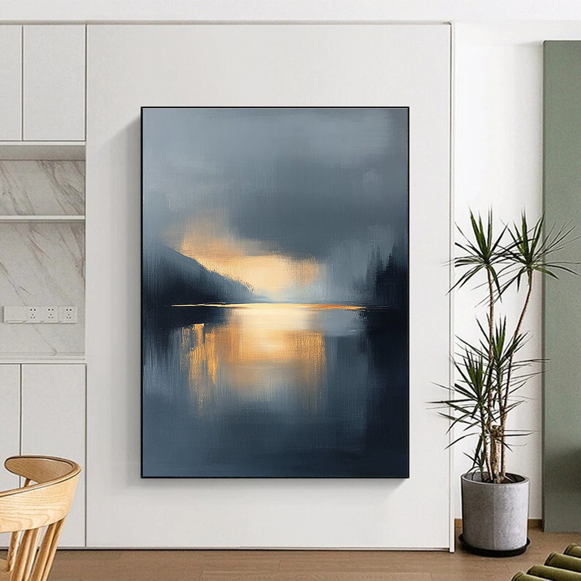 Large abstract oil painting featuring a lake and sky with navy blue and gold tones atmospheric clouds and reflections in calm waters.STSC167