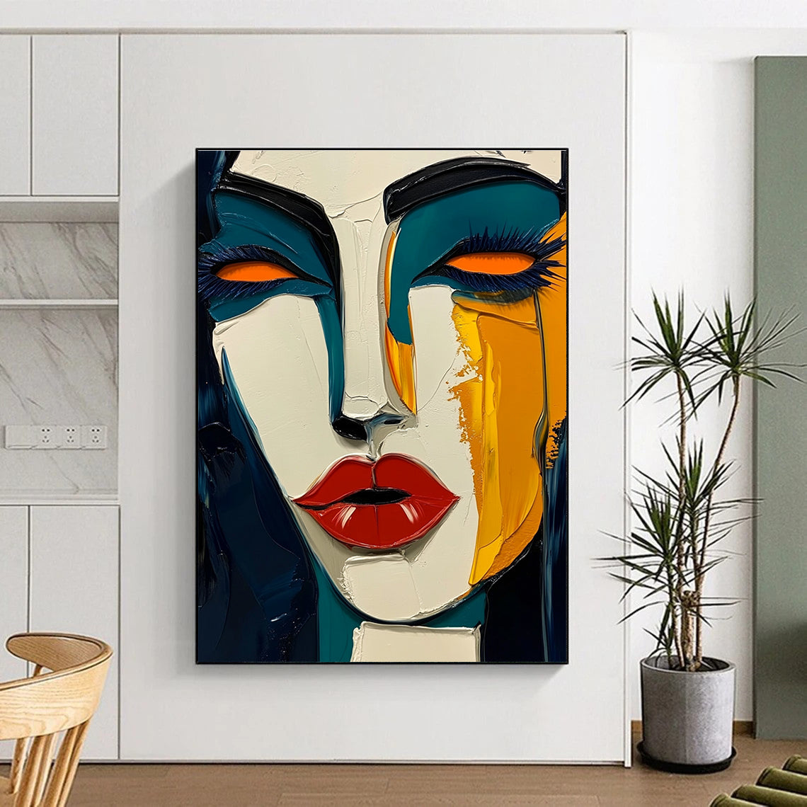 Large abstract painting in Picasso style featuring dark blue and yellow hues with bold red lips and green skin tone on a white background.STSC049