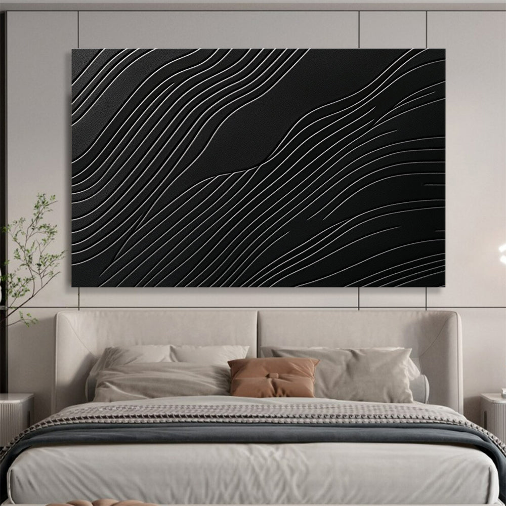 A large abstract artwork featuring elegant wave patterns on a matte black surface, showcasing layered textures and high contrast between light and dark tones.SC575