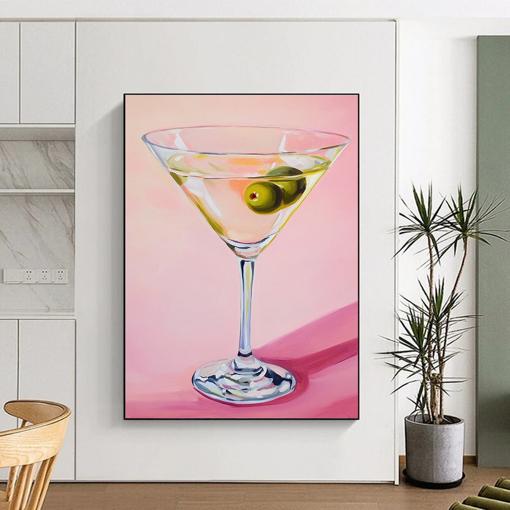 Abstract painting featuring a martini glass with an olive against a soft pink background showcasing gentle lighting and serene elegance.STSC1383