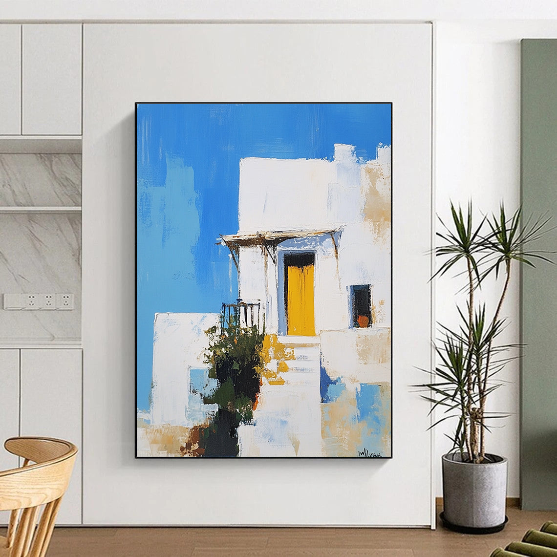 An abstract painting featuring a white Greek-style house with a yellow door against a blue sky inspired by Peter Wileman.STSC1253