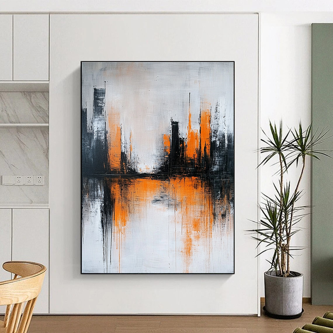 Large abstract painting featuring gray and white background with orange brushstrokes and urban landscape silhouette reflecting on water surface.STSC225