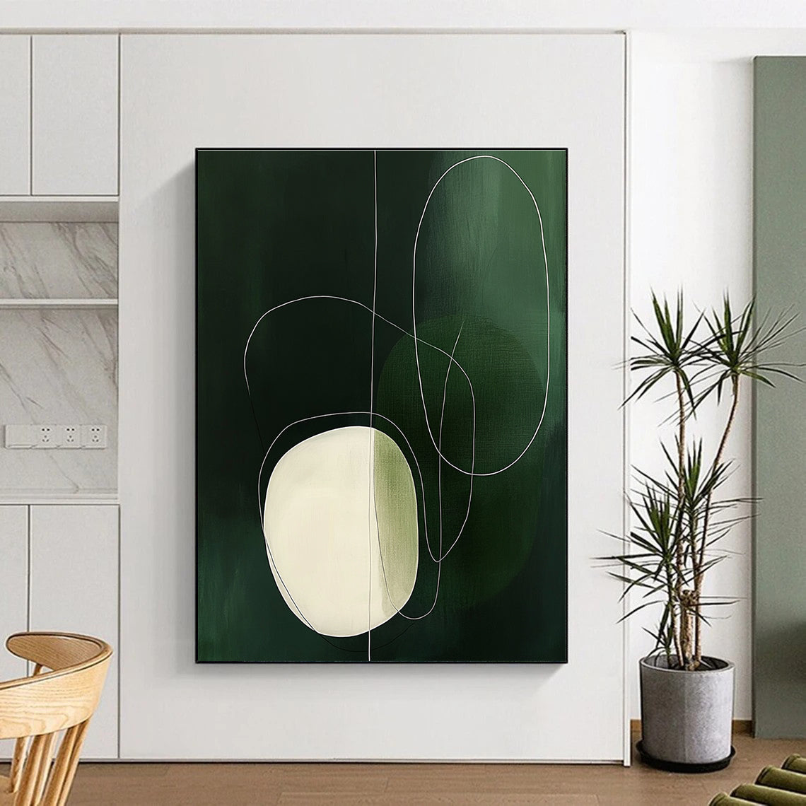 Large abstract painting featuring simple white and green shapes, an oval with delicate outlines, creating a serene and elegant atmosphere.STSC131