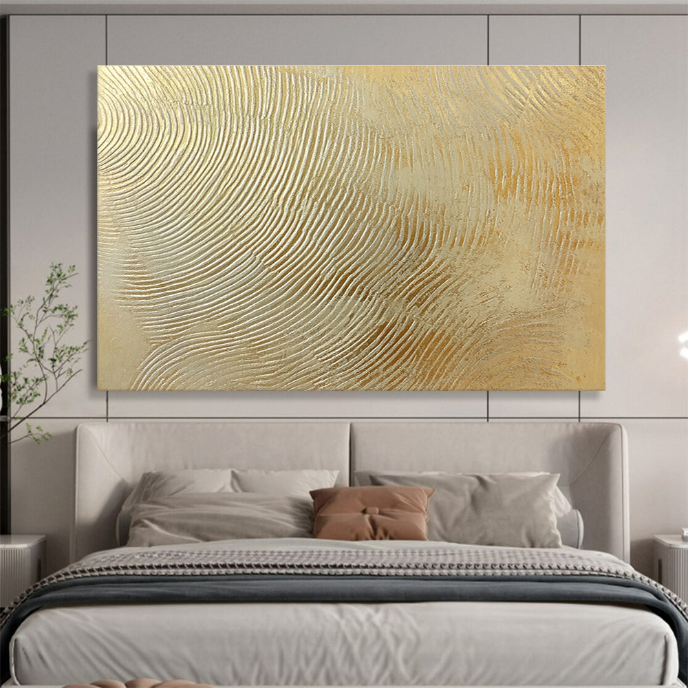 This large abstract painting features intricate wavy lines in gold and silver, creating a textured depth that enhances visual interest for design projects.SC559
