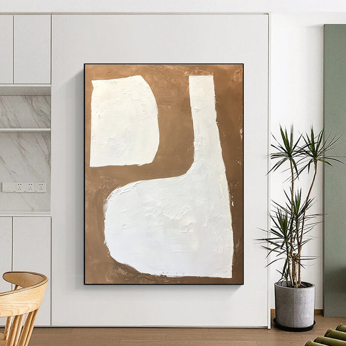Large abstract painting featuring white shapes on a brown background with textured brushstrokes in a minimalistic style.STSC1484