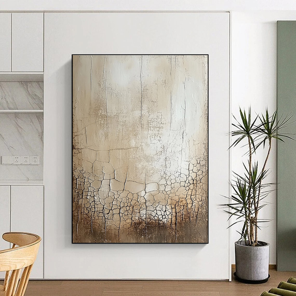 Large abstract painting featuring a blank canvas with a delicate white glaze showcasing random cracks and swirls in beige and gray shades.STSC292