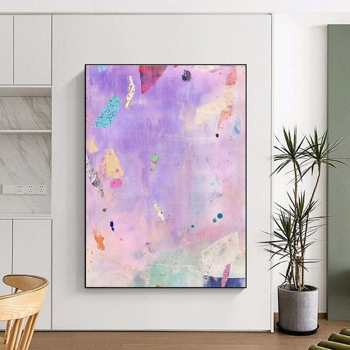 A large abstract painting featuring whimsical floating objects in lavender and pink with vintage fabric pieces and a serene dynamic composition that evokes joy.STSC1207