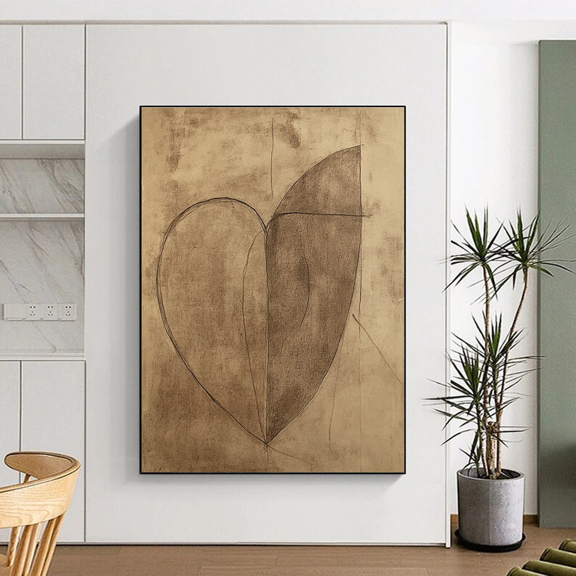 Large abstract heart drawing on brown paper featuring a continuous line shaped like a half-moon.STSC983