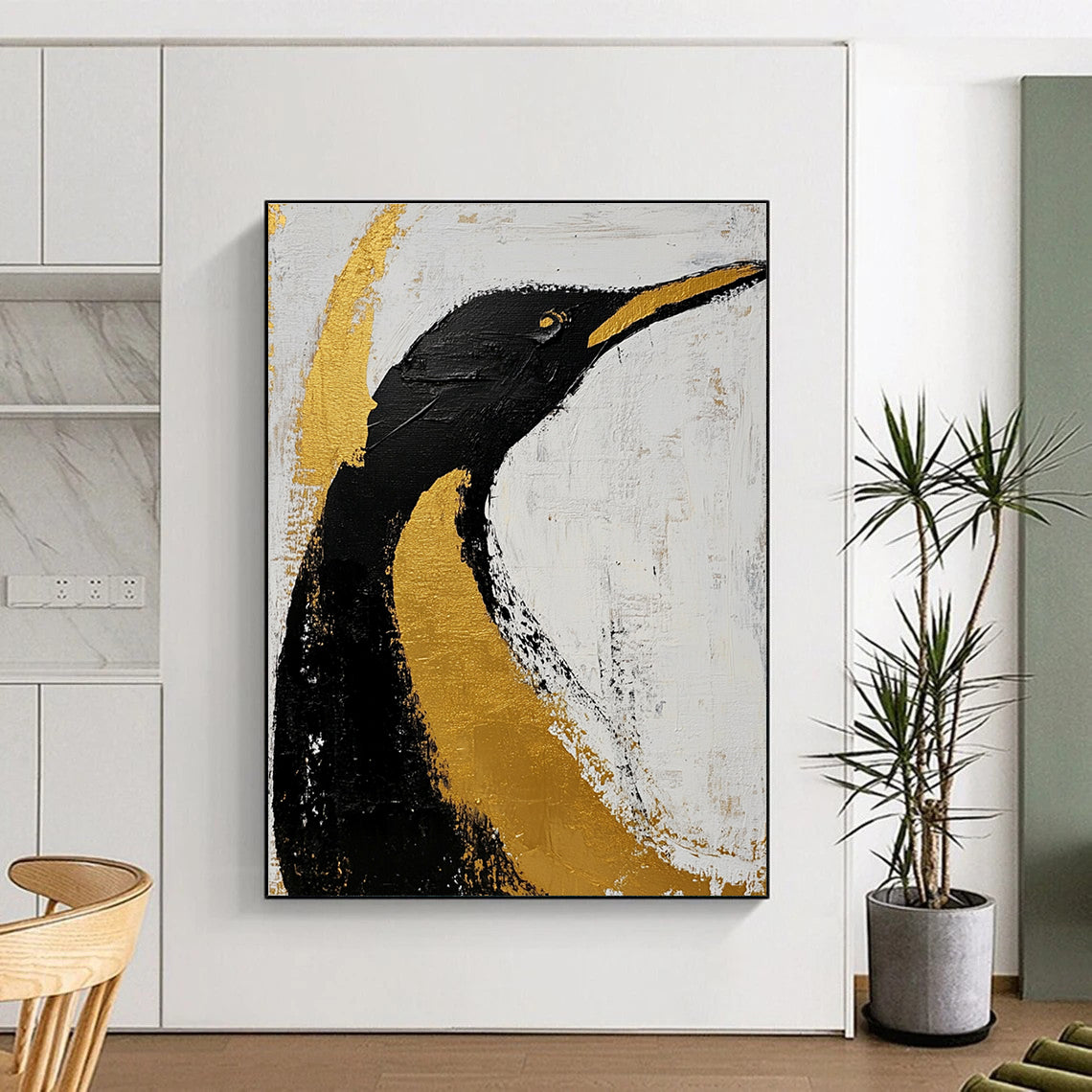 Large abstract art featuring a black and gold penguin on a white background with clean dark lines brush strokes and gold leaf accents.STSC010