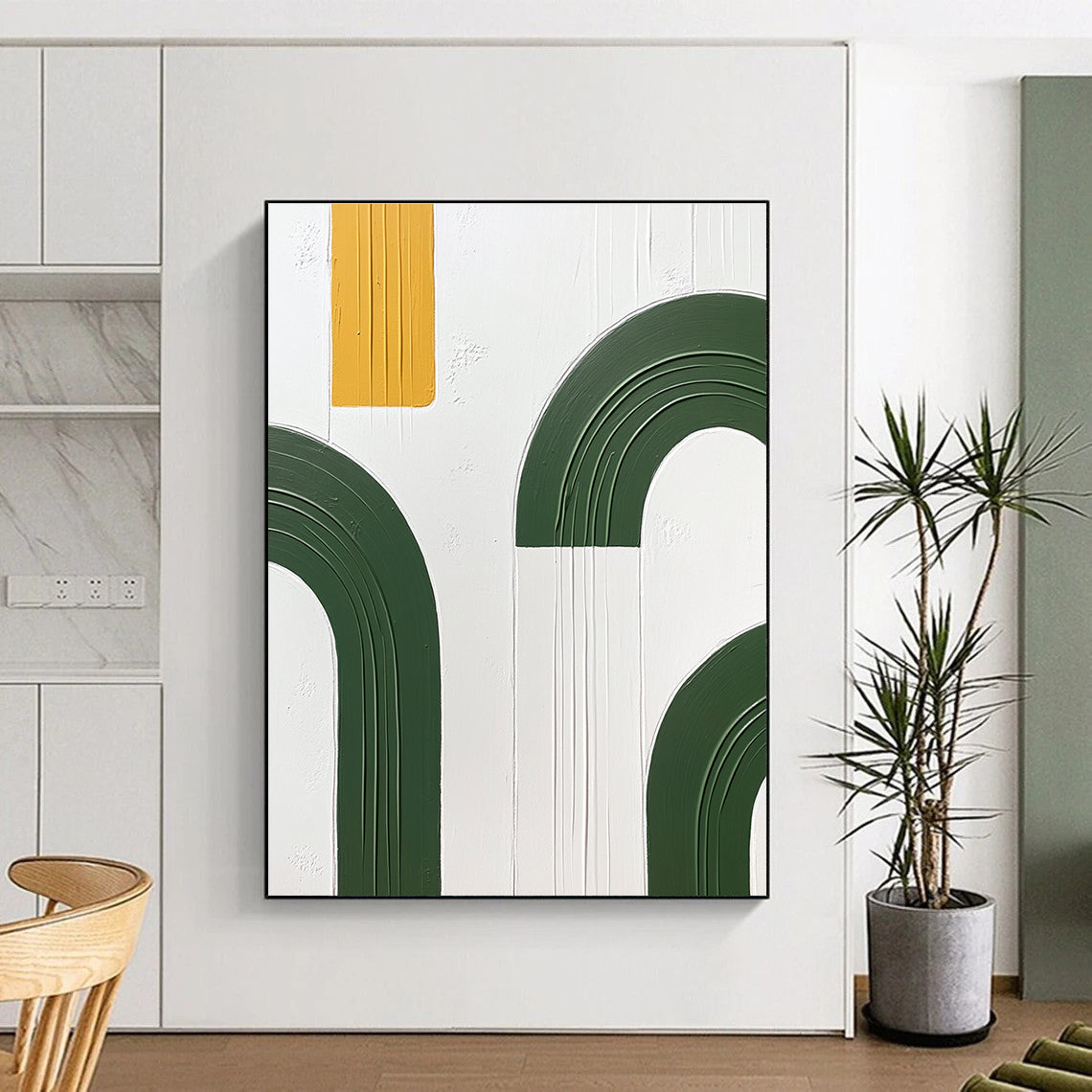 Large abstract painting featuring green arches and yellow circles on a white background with a hand-painted texture in oil paint.STSC1092