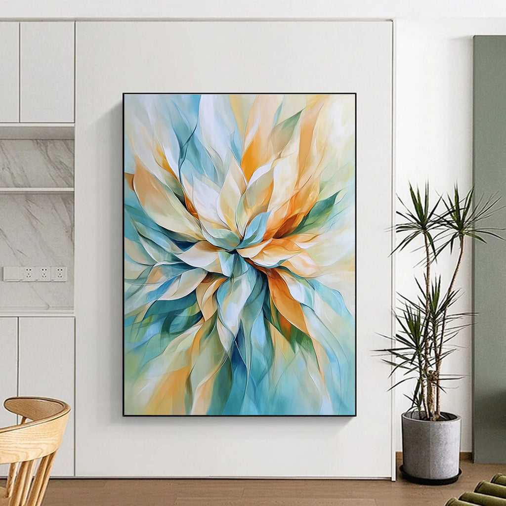 Abstract painting of a flower in light blue and beige with soft lines and pastel tones featuring accents of orange and green for depth.STSC670