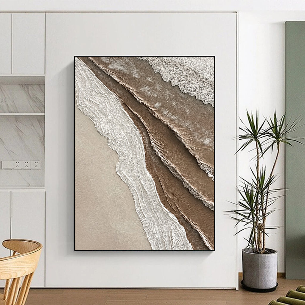 Abstract painting capturing textures where sand meets water in soft shades of brown beige white and grey ideal for enhancing any space.STSC951
