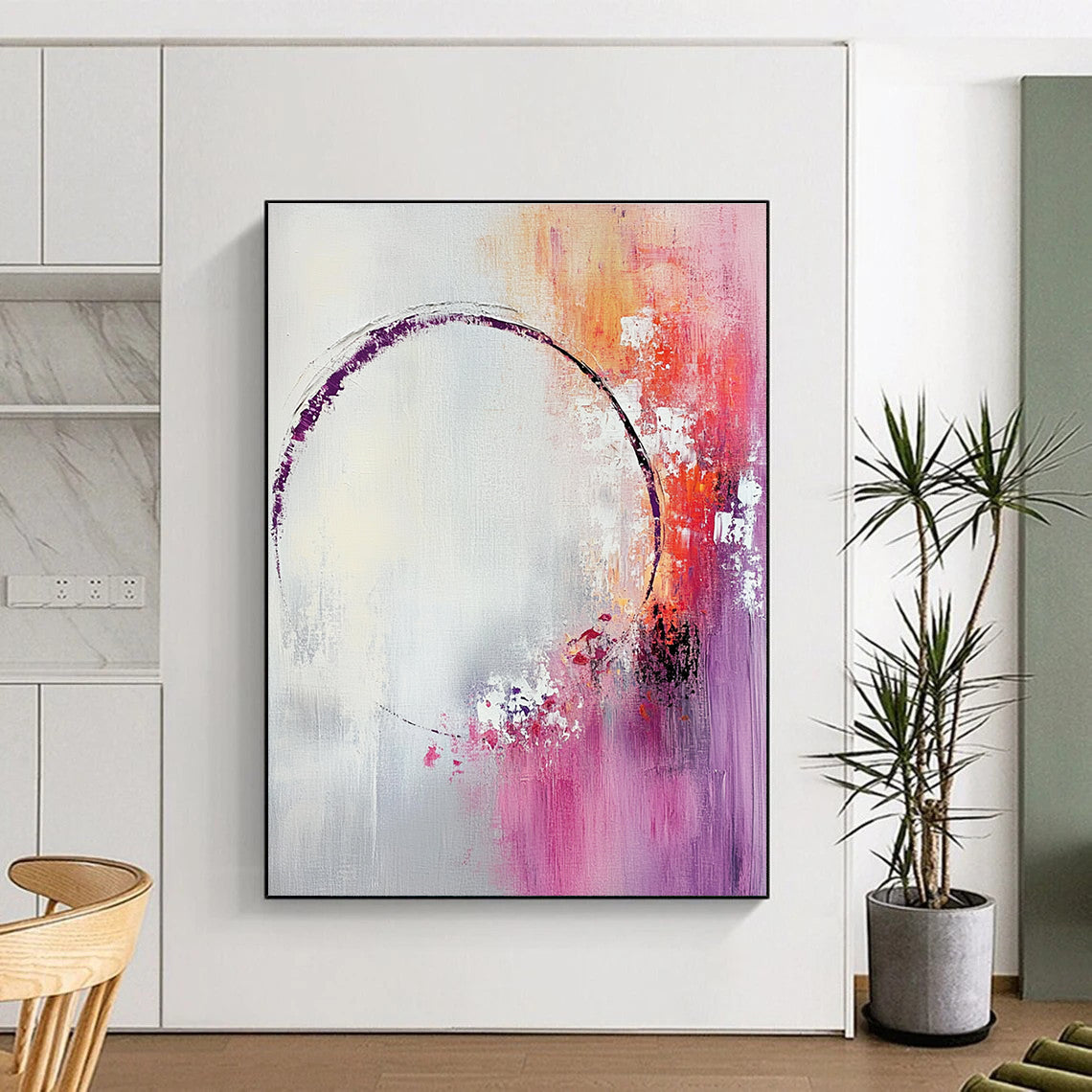 Large abstract painting featuring light pink and white shapes with a soft gray background and tranquil accents of purple and red.STSC429