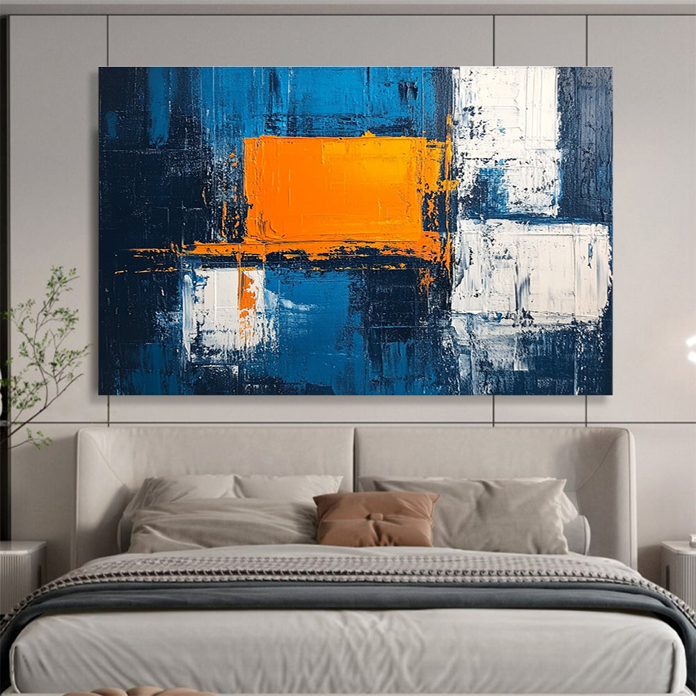 Large abstract painting featuring a textured pale blue background bold orange square white blocks and dark gray light indigo accents in acrylic.SC225