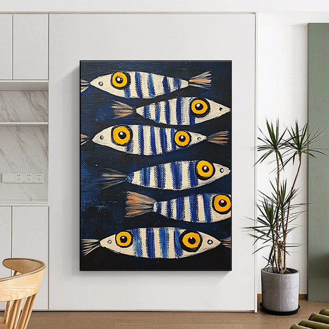 A large abstract painting featuring sardines with blue and white stripes and yellow eyes, set against a dark background.STSC1171