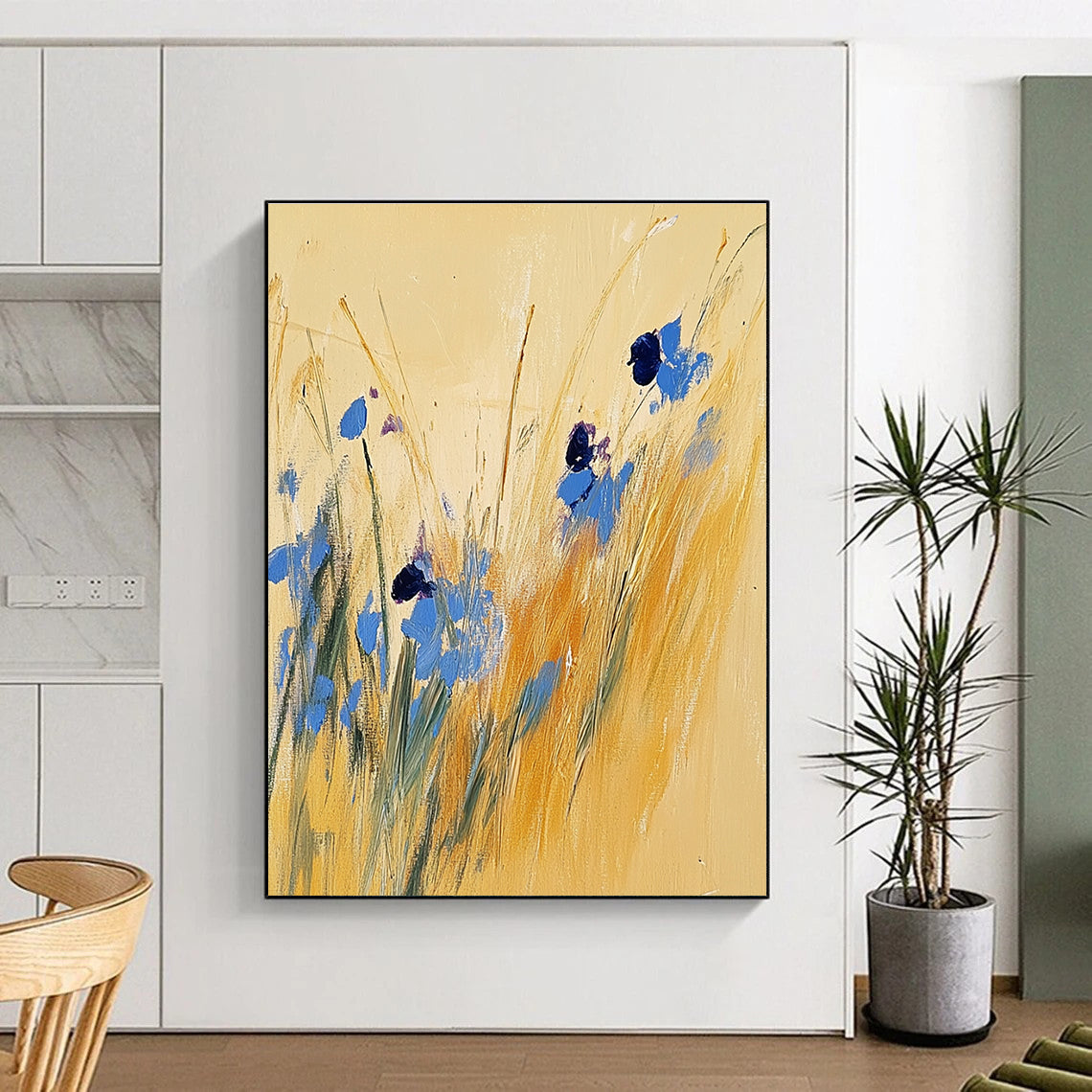 Large abstract painting of tall grass and blue wildflowers on a light yellow background inspired by Joseph Mallord William Turner.STSC336