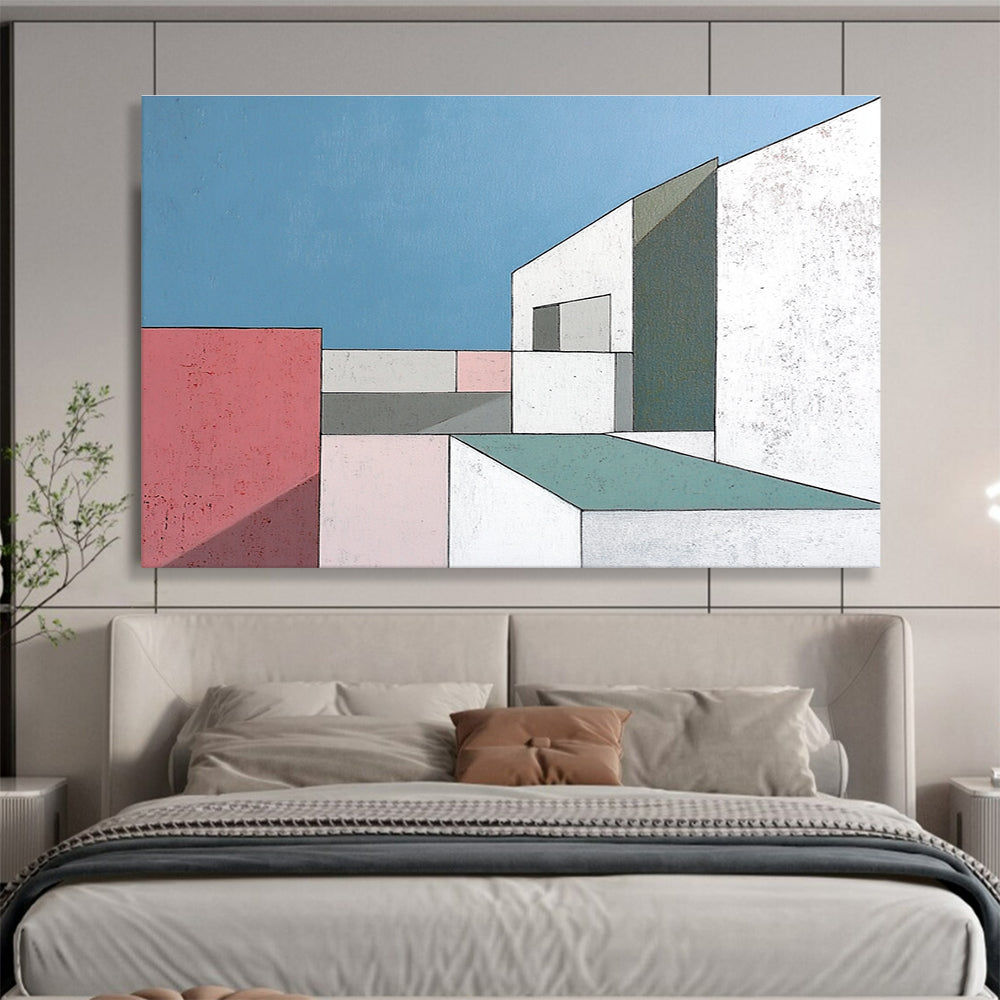 A large abstract painting featuring minimalist white buildings with large windows against a serene blue sky highlighting sharp color contrasts and geometric shapes.SC487