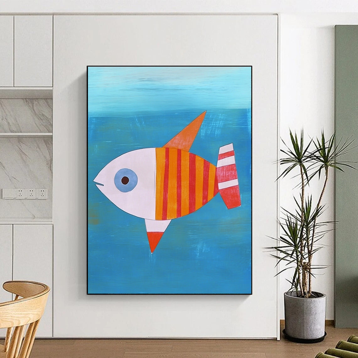 A large abstract painting featuring a flat illustration of a fish with an orange-red body and white stripes swimming in blue water.STSC995
