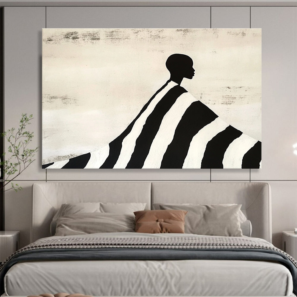 An abstract painting featuring a silhouette of an African man draped in a black and white striped blanket, evoking Tim Walker's artistic style.SC428