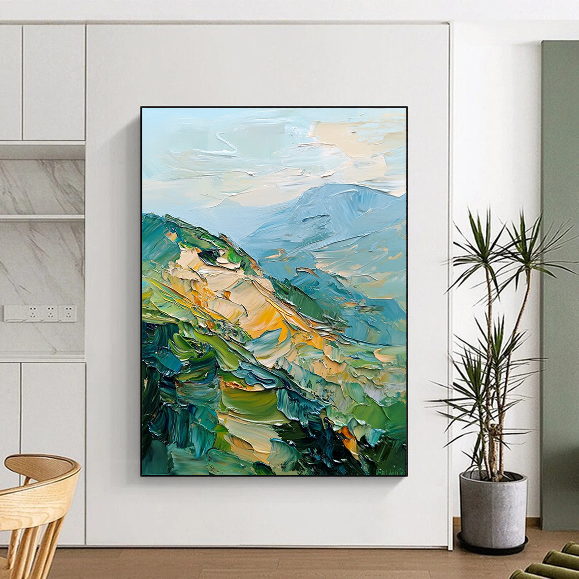 Large abstract painting of mountains featuring palette knife texture and thick brush strokes in a blend of greens blues and golds.STSC192