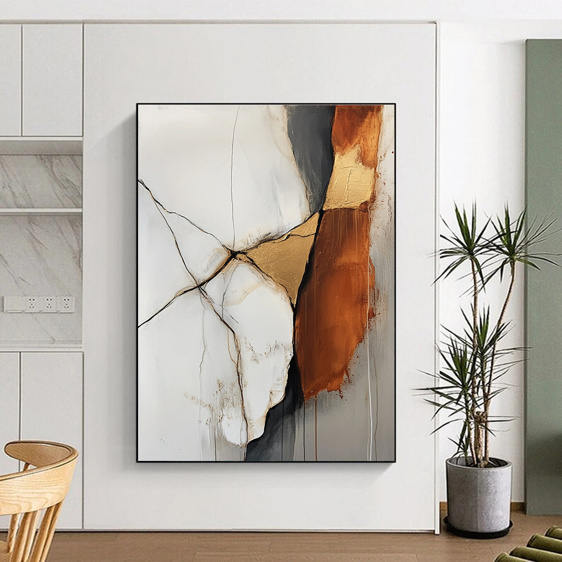Large abstract painting featuring an off white and rust colored rock with gold veins in a minimalistic style and soft delicate strokes.STSC655