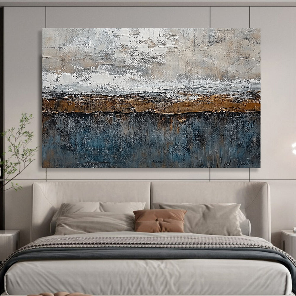 Large abstract painting features textured layers of grey, brown, blue, and bronze with painterly strokes and metal accents creating an artistic landscape.SC174